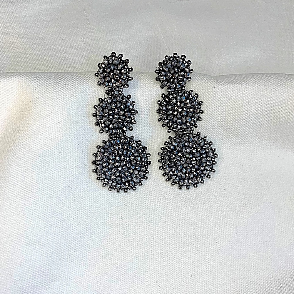 Earrings from various retailers. Jcrew, Ann Taylor, And Cache